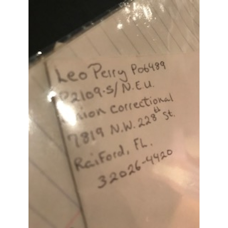 Leo Perry handwritten envelope with 10 lines penned by him from 2003