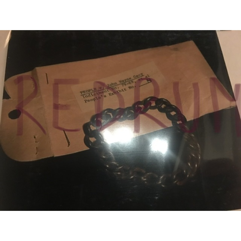 John Wayne Gacy 4 x 4.5 photograph of a victim’s bracelet shown as exhibit No. 8