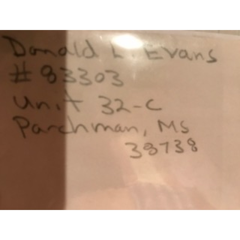 Donald Leroy Evans handwritten envelope with numerous lines penned by him from 1998